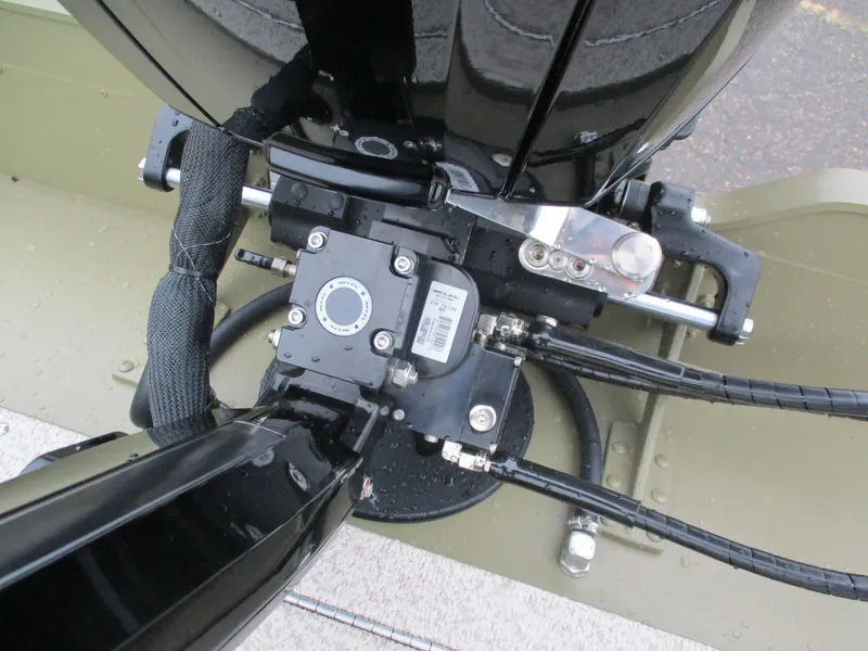 Slide: The Image of Close-up of a Lund Alaskan 1875 Tiller 2026 engine. - 11