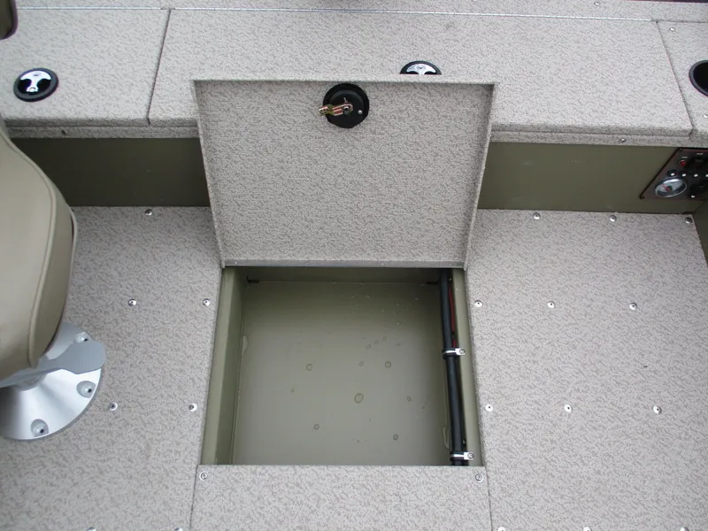 Slide: The Image of Lund Alaskan 1875 Tiller 2026 boat with open storage compartment. - 5