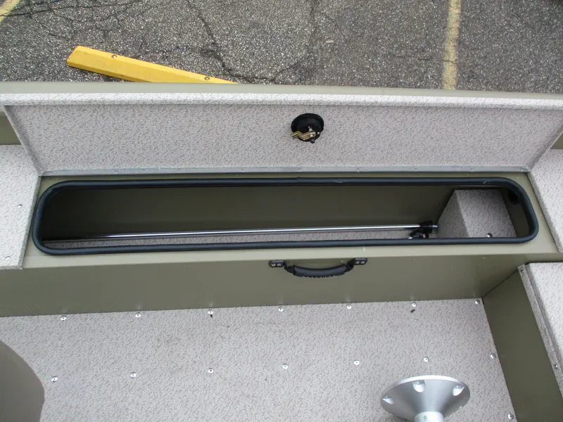 Slide: The Image of Lund Alaskan 1875 Tiller 2026 boat storage compartment. - 6