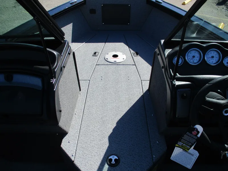 Slide: The Image of Interior of 2026 Lund 1875 Fisherman with dashboard and storage area. - 5