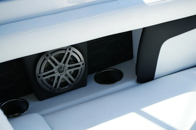Slide: The Image of 2026 Four Winns HD3 OB boat interior with JL Audio speaker and cup holders. - 12