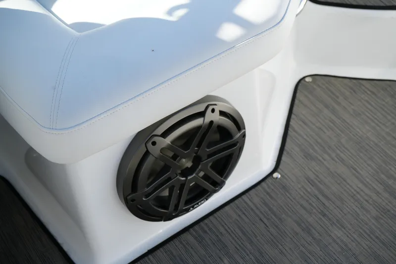 Slide: The Image of 2026 Four Winns HD3 OB boat interior with speaker and cushioned seating. - 13