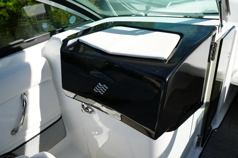 Slide: The Image of 2026 Four Winns HD3 OB boat interior with sleek black and white design. - 15