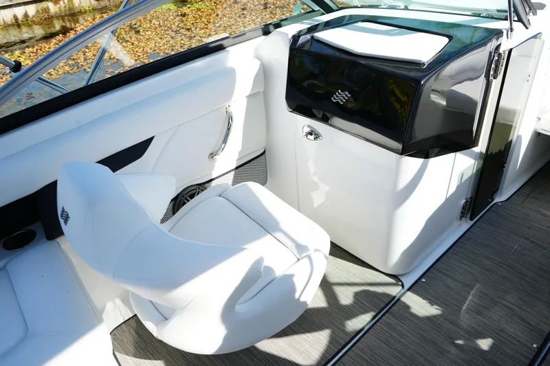 Slide: The Image of 2026 Four Winns HD3 OB boat interior with white seating and sleek design. - 21