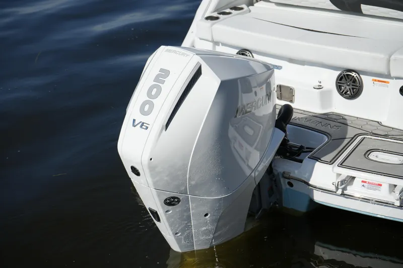 Slide: The Image of 2026 Four Winns HD3 OB boat with Mercury 200 V6 outboard engine on water. - 42