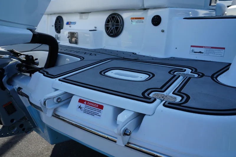 Slide: The Image of 2026 Four Winns HD3 OB boat deck with safety warnings and sleek design. - 9