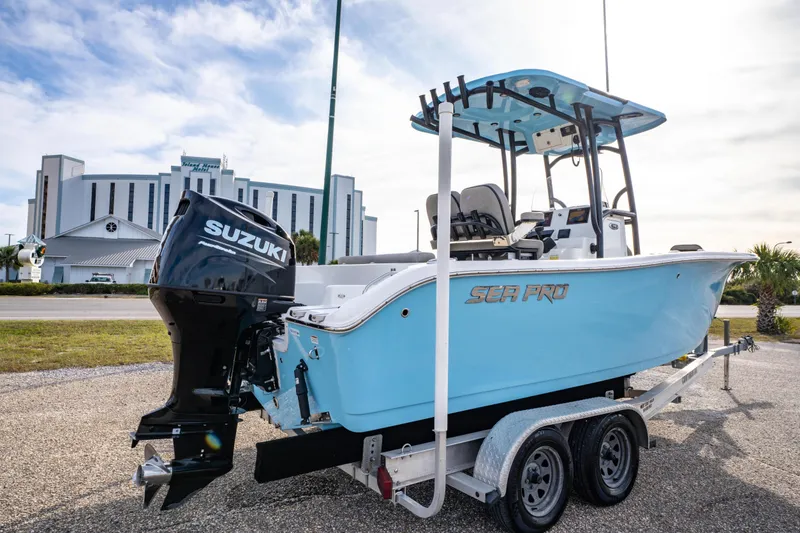 Slide: The Image of 2021 Sea Pro 219 Center Console boat with Suzuki engine on trailer. - 3