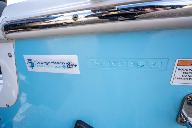 Slide: The Image of 2021 Sea Pro 219 Center Console boat with Orange Beach sales sticker and serial number. - 33