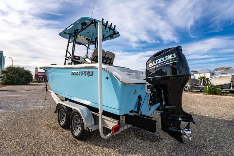 Slide: The Image of 2021 Sea Pro 219 Center Console boat with Suzuki outboard motor on trailer. - 5