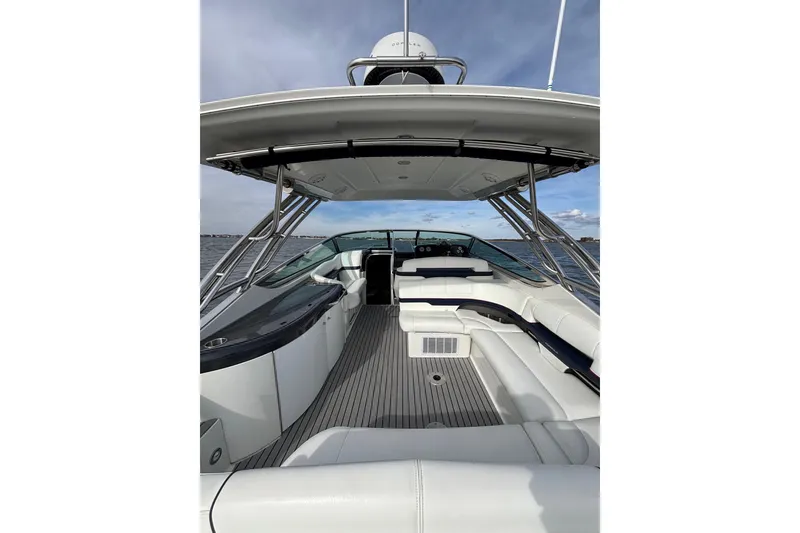 Slide: The Image of 2017 Formula 370 Super Sport boat interior with sleek seating and open water view. - 13