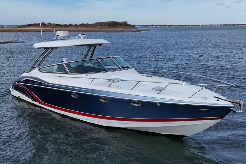 Slide: The Image of 2017 Formula 370 Super Sport boat on calm water. - 21