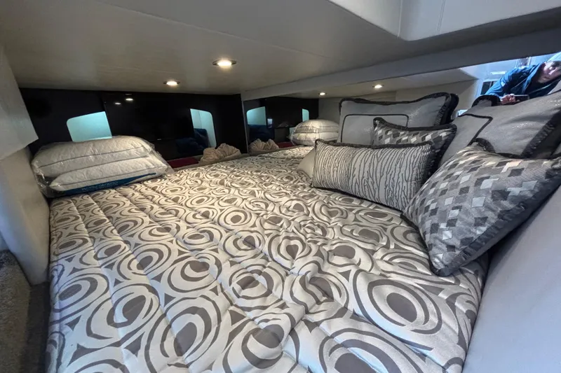 Slide: The Image of Luxurious cabin interior of 2017 Formula 370 Super Sport with elegant bedding and pillows. - 28