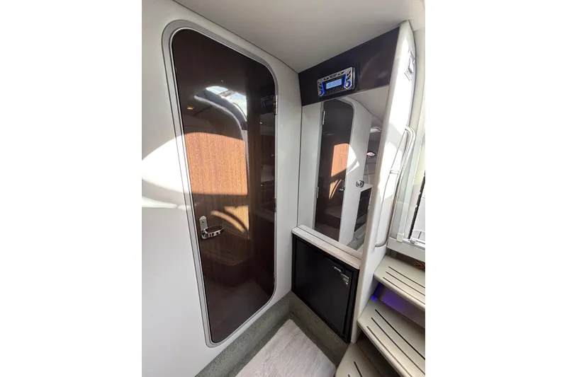 Slide: The Image of Interior of 2017 Formula 370 Super Sport boat, featuring sleek design and modern amenities. - 29