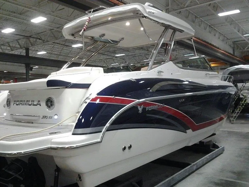 Slide: The Image of 2017 Formula 370 Super Sport boat in a warehouse. - 34