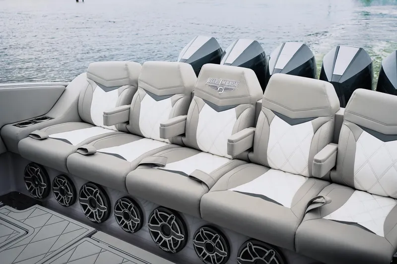Slide: The Image of Luxury seating on 2026 Deep Impact 499 Sport boat with stylish design and powerful engines. - 30