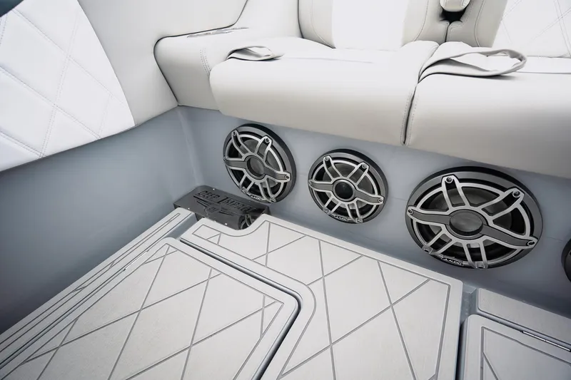 Slide: The Image of Luxury interior of 2026 Deep Impact 499 Sport boat with premium speakers and seating. - 31