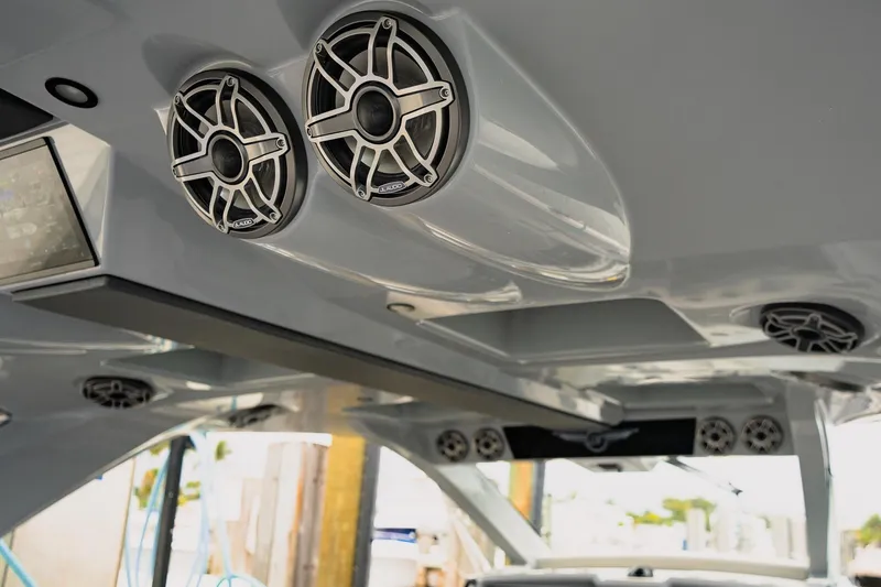 Slide: The Image of Interior of 2026 Deep Impact 499 Sport boat with premium audio speakers. - 33