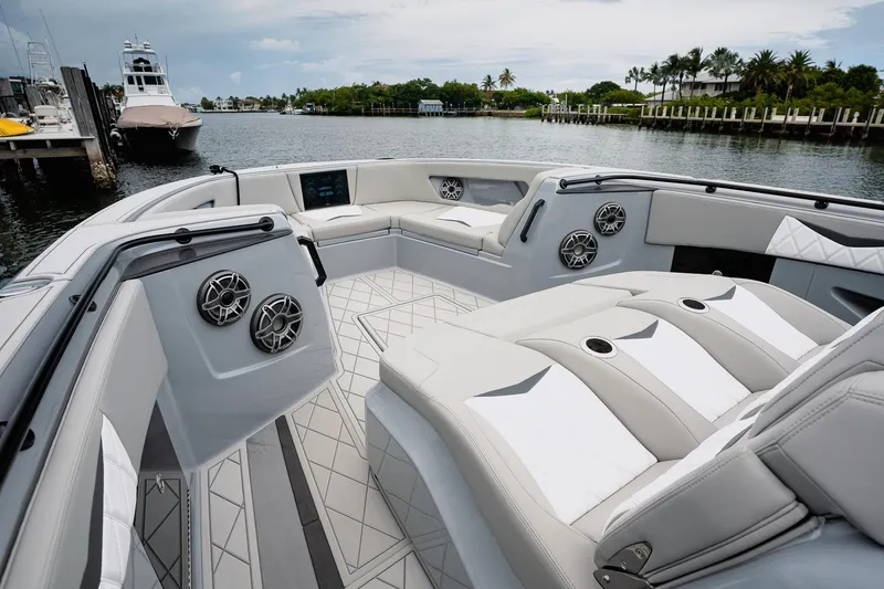 Slide: The Image of Luxurious 2026 Deep Impact 499 Sport boat interior with plush seating and modern design. - 36