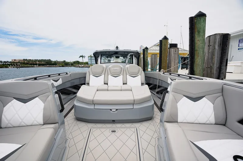 Slide: The Image of Luxury interior of 2026 Deep Impact 499 Sport boat docked at marina. - 37