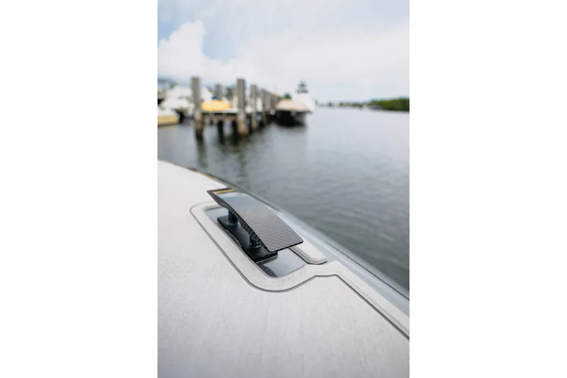 Slide: The Image of Close-up of 2026 Deep Impact 499 Sport boat cleat by the dock. - 40