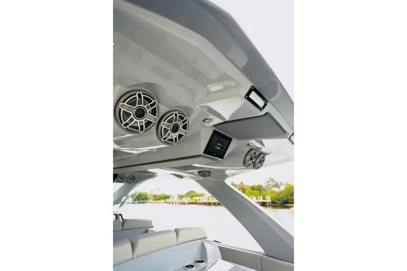 Slide: The Image of Interior view of 2026 Deep Impact 499 Sport boat with speakers and control panel. - 54