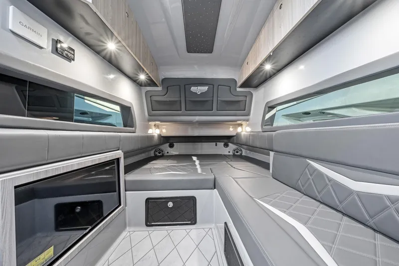 Slide: The Image of Luxurious interior of 2026 Deep Impact 499 Sport boat with modern seating and lighting. - 56