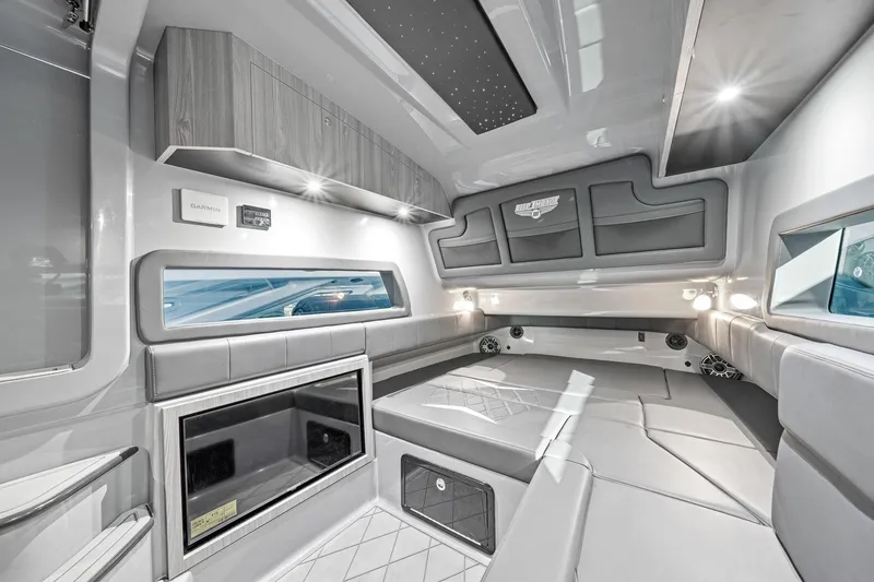 Slide: The Image of Luxurious interior of 2026 Deep Impact 499 Sport boat with modern amenities and sleek design. - 60