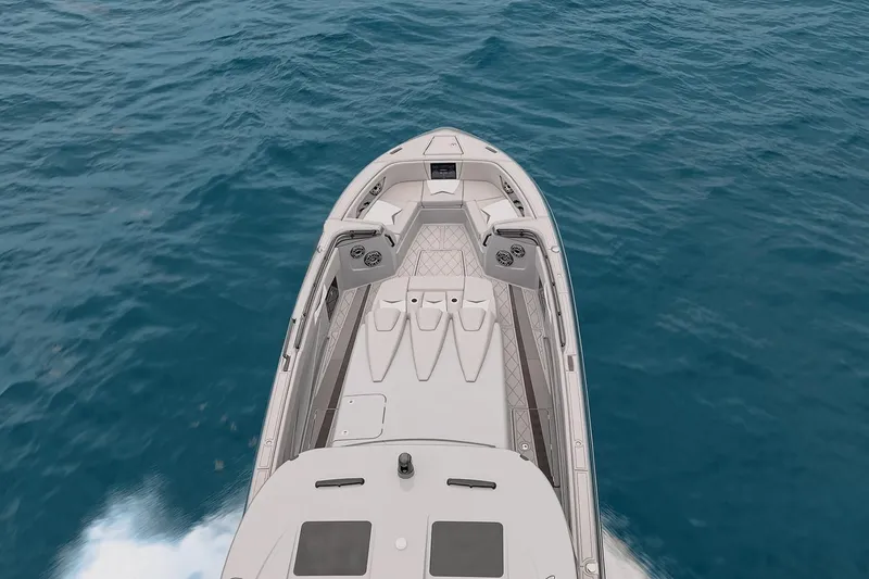 Slide: The Image of Top view of 2026 Deep Impact 499 Sport boat cruising on open water. - 64