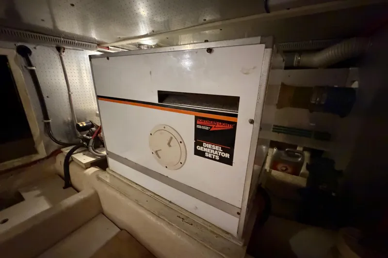 Slide: The Image of Diesel generator in 1988 Offshore Yachts 48 Sedan engine room. - 81