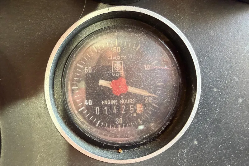 Slide: The Image of Engine hour meter showing 1425 hours on 1988 Offshore Yachts 48 Sedan. - 88