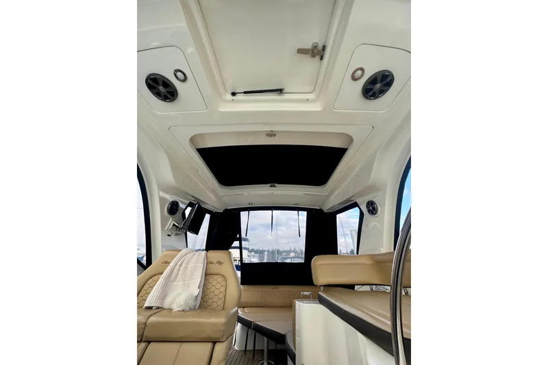 Slide: The Image of Interior of 2021 Sea Ray Sundancer 350 yacht with beige seating and modern design. - 22