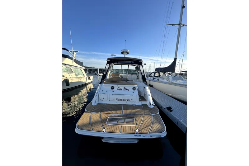 Slide: The Image of 2021 Sea Ray Sundancer 350 yacht docked at marina, rear view. - 33