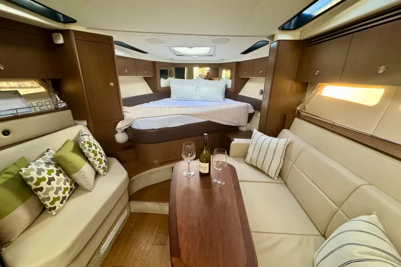 Slide: The Image of Luxurious interior of 2021 Sea Ray Sundancer 350 yacht with cozy seating and elegant decor. - 6
