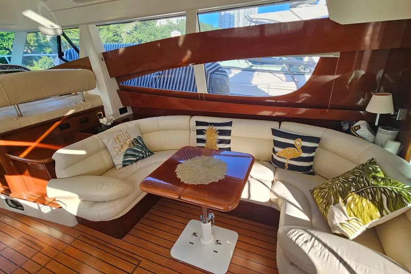 Slide: The Image of 2005 Prestige 46 yacht cockpit with modern controls and leather seating. - 22