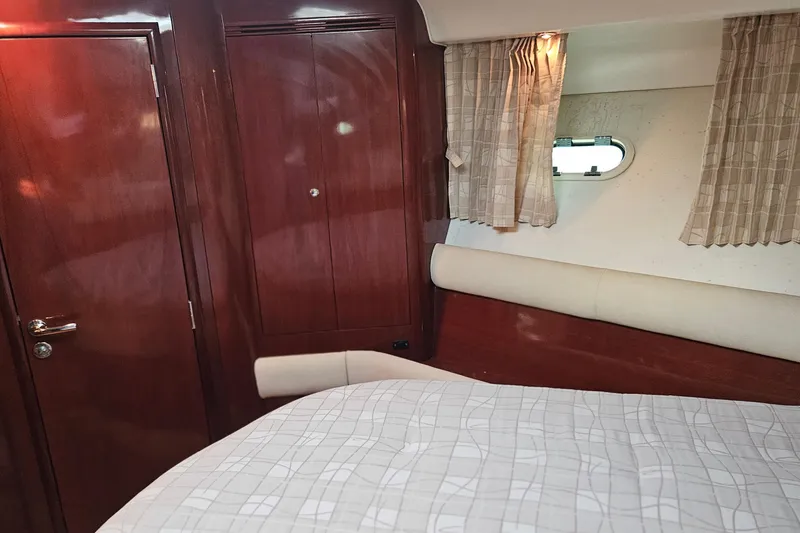 Slide: The Image of Bathroom interior of a 2005 Prestige 46 yacht with toilet and sink. - 31