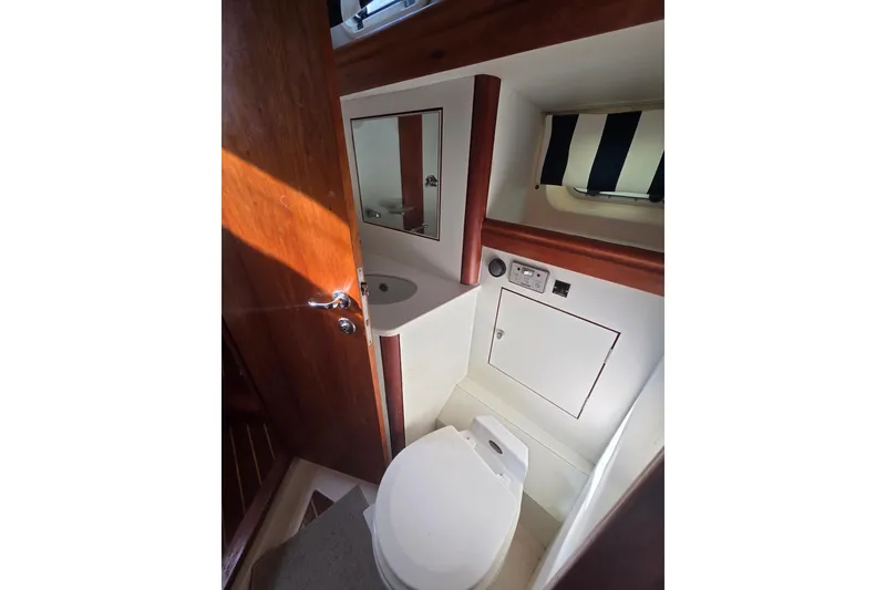 Slide: The Image of Luxurious cabin interior of 1998 Oyster 485 Deck Saloon yacht with cozy bedding. - 18