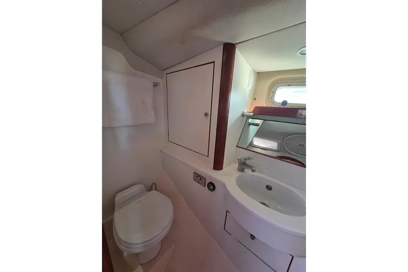Slide: The Image of Bathroom interior of 1998 Oyster 485 Deck Saloon yacht with sink and shower. - 23