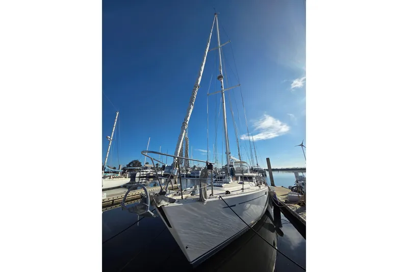 Slide: The Image of Sailing yacht Oyster 485 Deck Saloon, 1998 model, docked under clear blue sky. - 3