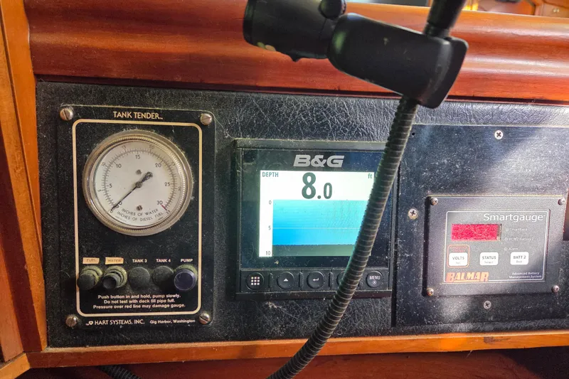 Slide: The Image of Control panel with communication devices on a 1998 Oyster 485 Deck Saloon yacht. - 32