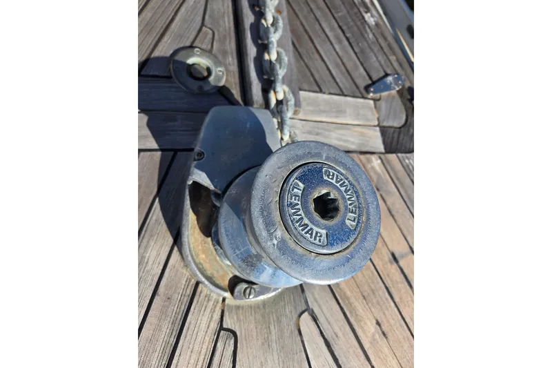 Slide: The Image of Close-up of a 1998 Oyster 485 Deck Saloon yacht's polished metal fitting. - 48