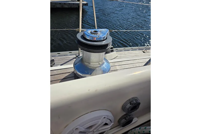 Slide: The Image of Solar panel on 1998 Oyster 485 Deck Saloon yacht, docked with clear sky background. - 53