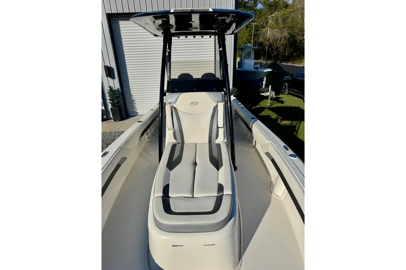 Slide: The Image of 2021 ShearWater 27 Carolina boat with sleek seating and modern design. - 7