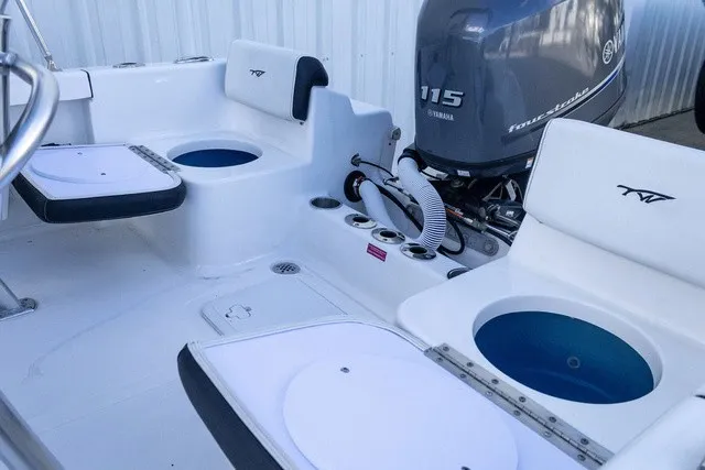 Slide: The Image of The image shows the stern of a Tidewater 180 CC Adventure boat with a Yamaha 115 outboard motor. - 8