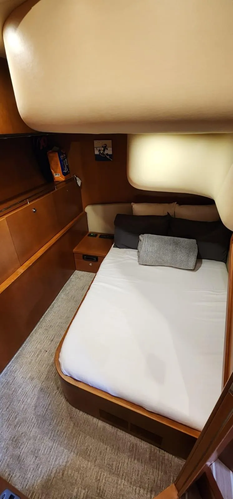 Slide: The Image of Luxurious cabin interior of a 2007 Uniesse 54 Sport yacht. - 17