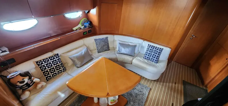 Slide: The Image of Luxurious interior of a 2007 Uniesse 54 Sport yacht with plush seating and stylish decor. - 22