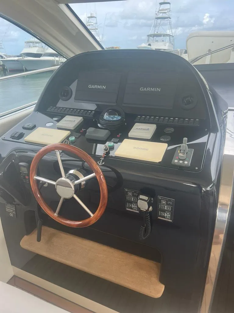 Slide: The Image of Helm of 2007 Uniesse 54 Sport yacht with Garmin navigation systems. - 4