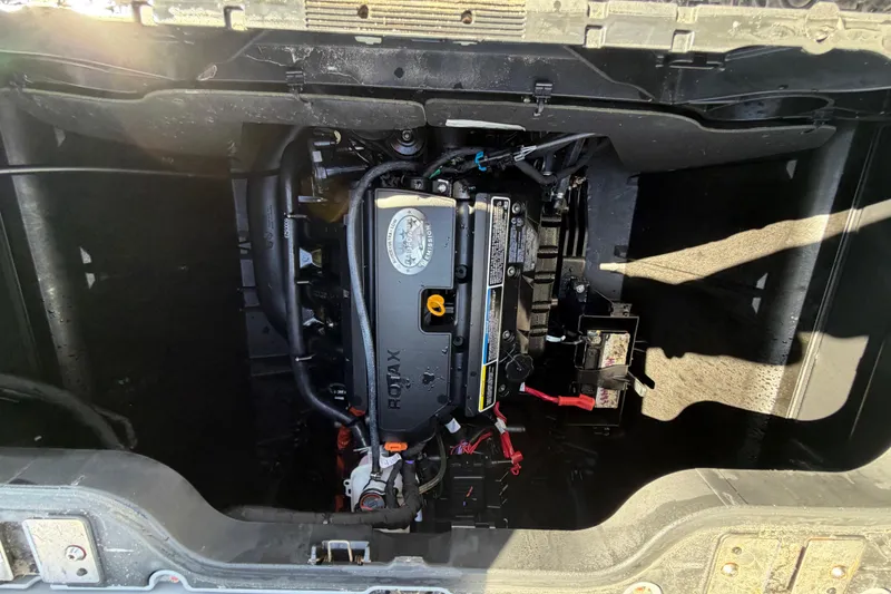 Slide: The Image of Engine compartment of 2023 Sea-Doo Switch Cruise 21, featuring Rotax engine components. - 15