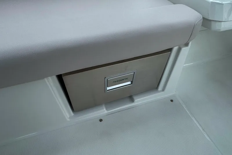 Slide: The Image of Wooden storage cabinet inside 2026 Beneteau Antares 11 boat interior. - 29