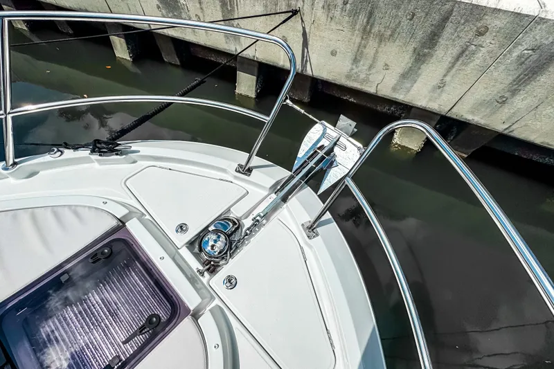 Slide: The Image of Bow of 2026 Beneteau Antares 11 yacht with anchor and railing detail. - 42