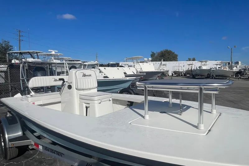 Slide: The Image of 2026 Maverick HPX-17 V boat in a marina, clear sky background. - 4